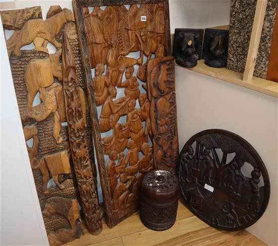 A group of Kenyan tribal carvings, book-ends and lidded pot (10)